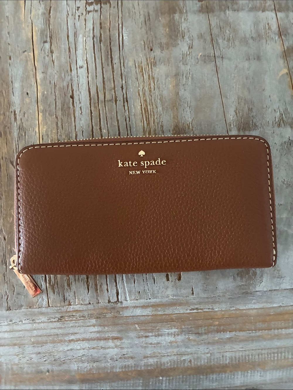 kate spade brown pebbled leather zip wallet with gold logo